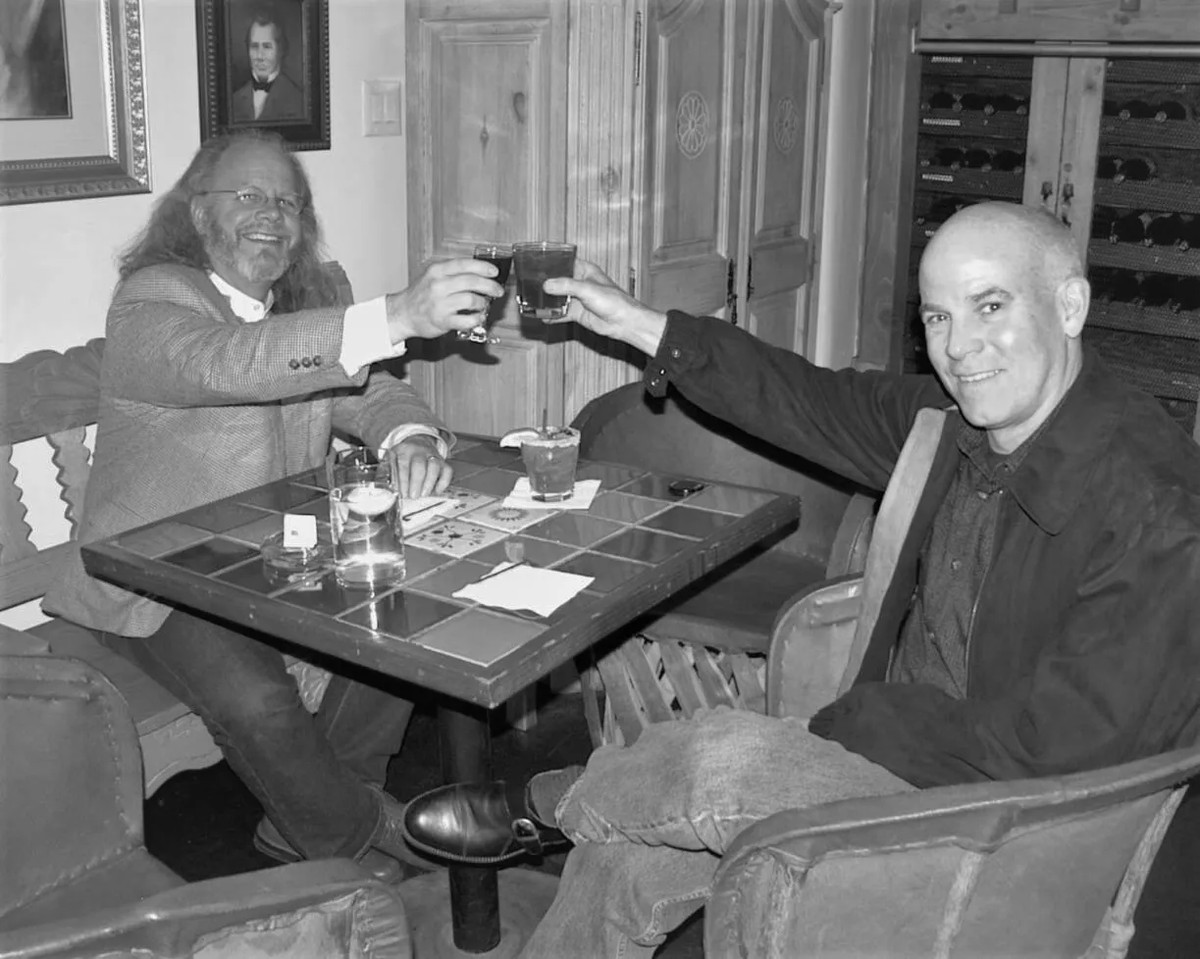 Phil Lawson and Robert L. Lindstrom raising a toast together